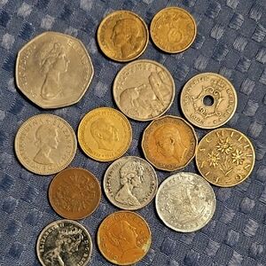 Lot Of 14 Assorted International Coins. German,Canadian,French,Belgian Etc.